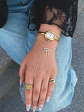 white strass eye gold hand chain