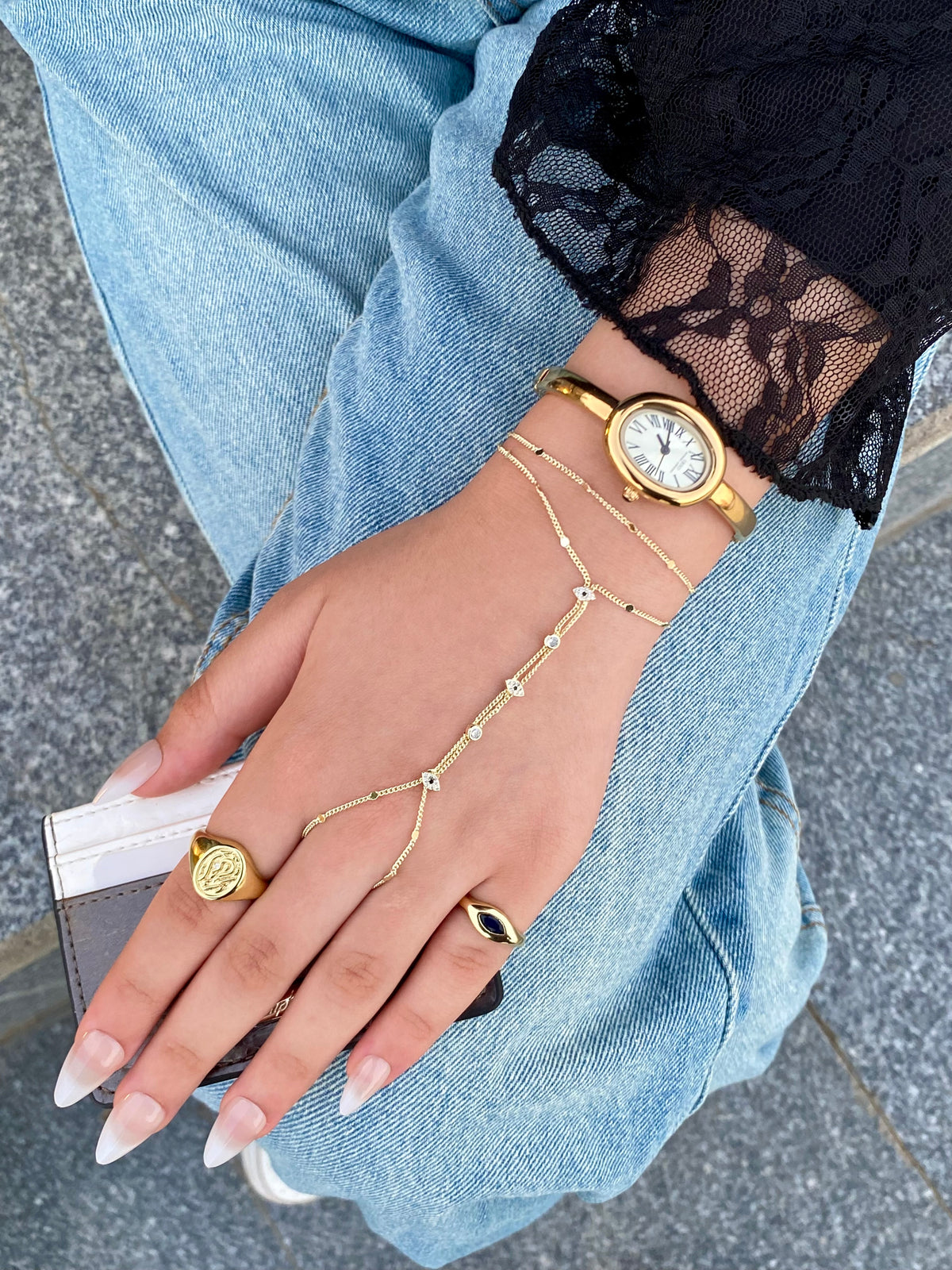 white strass eye gold hand chain
