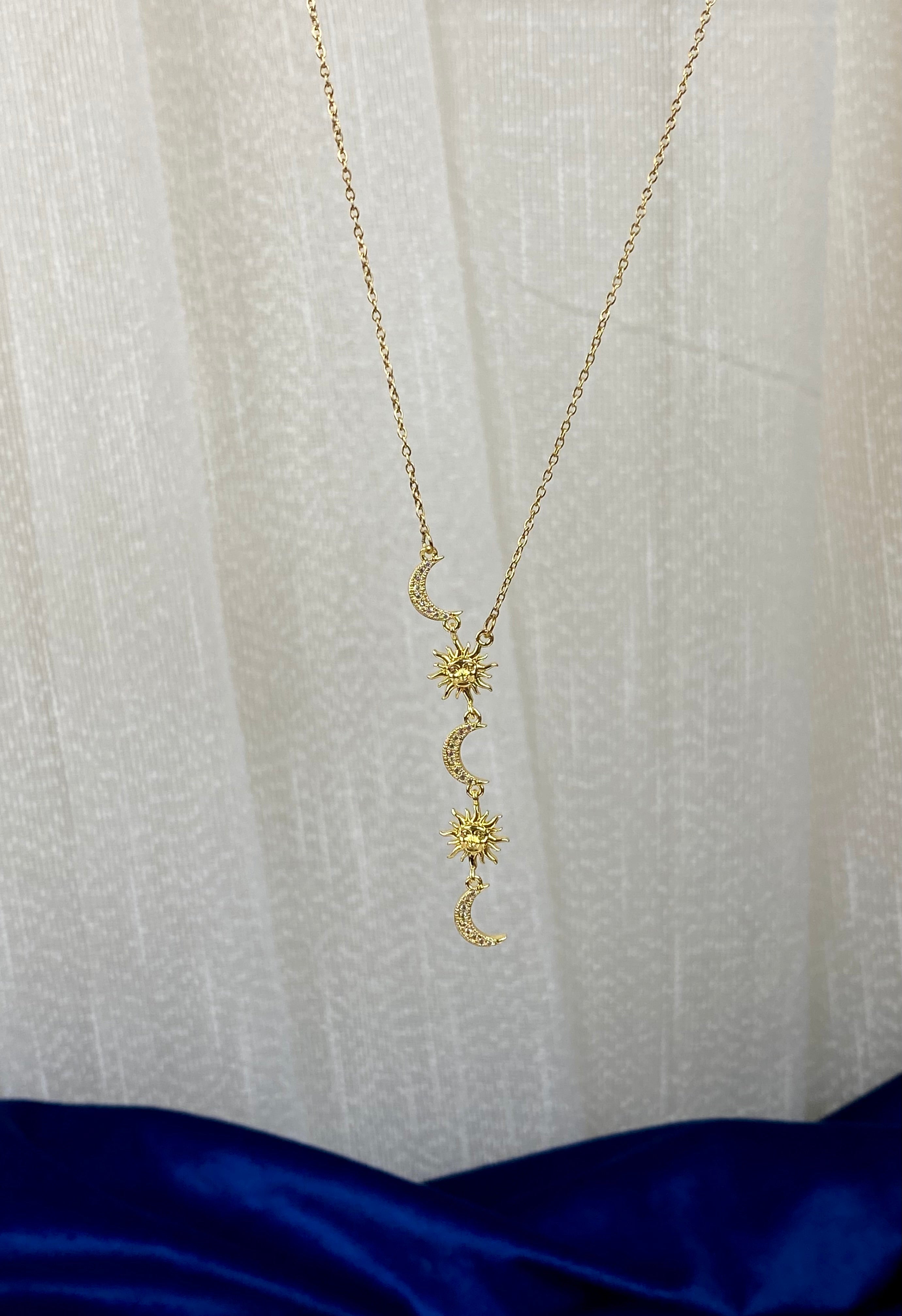 gold charms gold sun drop necklace